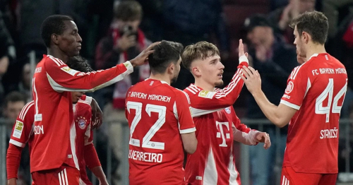 Bayern Munich players celebrating a goal in the match against Borussia