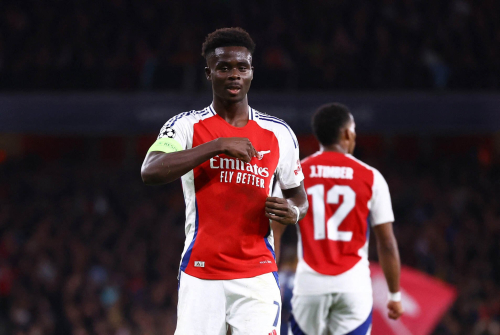 Bukayo Saka celebrates against PSG Paris Saint-German in the UEFA Champions League 