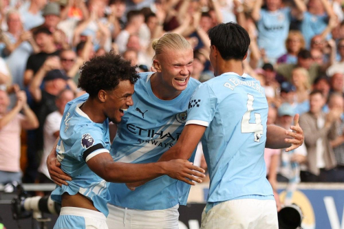 Opening weekend of 2025-26 | Season 35 of the English Premier League | Manchester City players, Oscar Bobb, Erling Haaland and Tijjani Reijnders, celebrate against Wolves.